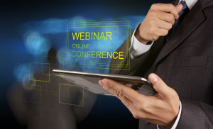 businessman hand show webinar online conference as concept